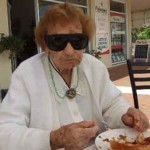Elderly woman in shades